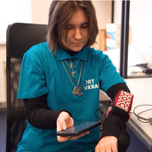 Viktoriia demonstrates her SoundAid bracelet